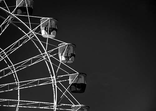 ferris wheel grayscale photography of Ferris wheel black